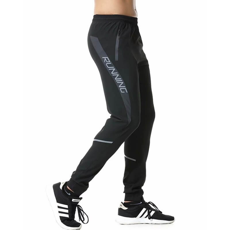 Men's casual black running joggers with zipper pockets, lightweight polyester, perfect fit. Ideal for running and workouts.